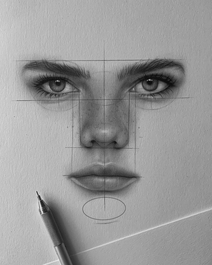 Charcoal portrait in progress with pencil and construction guide lines