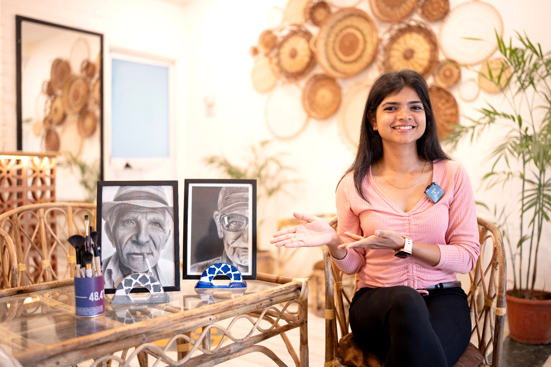 Woman drawing a portrait at home
