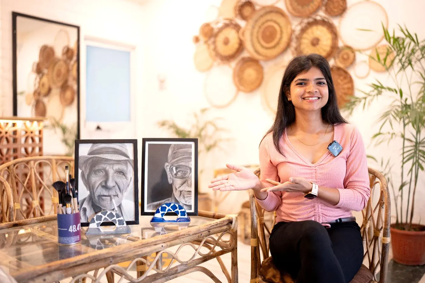 Woman drawing a portrait at home