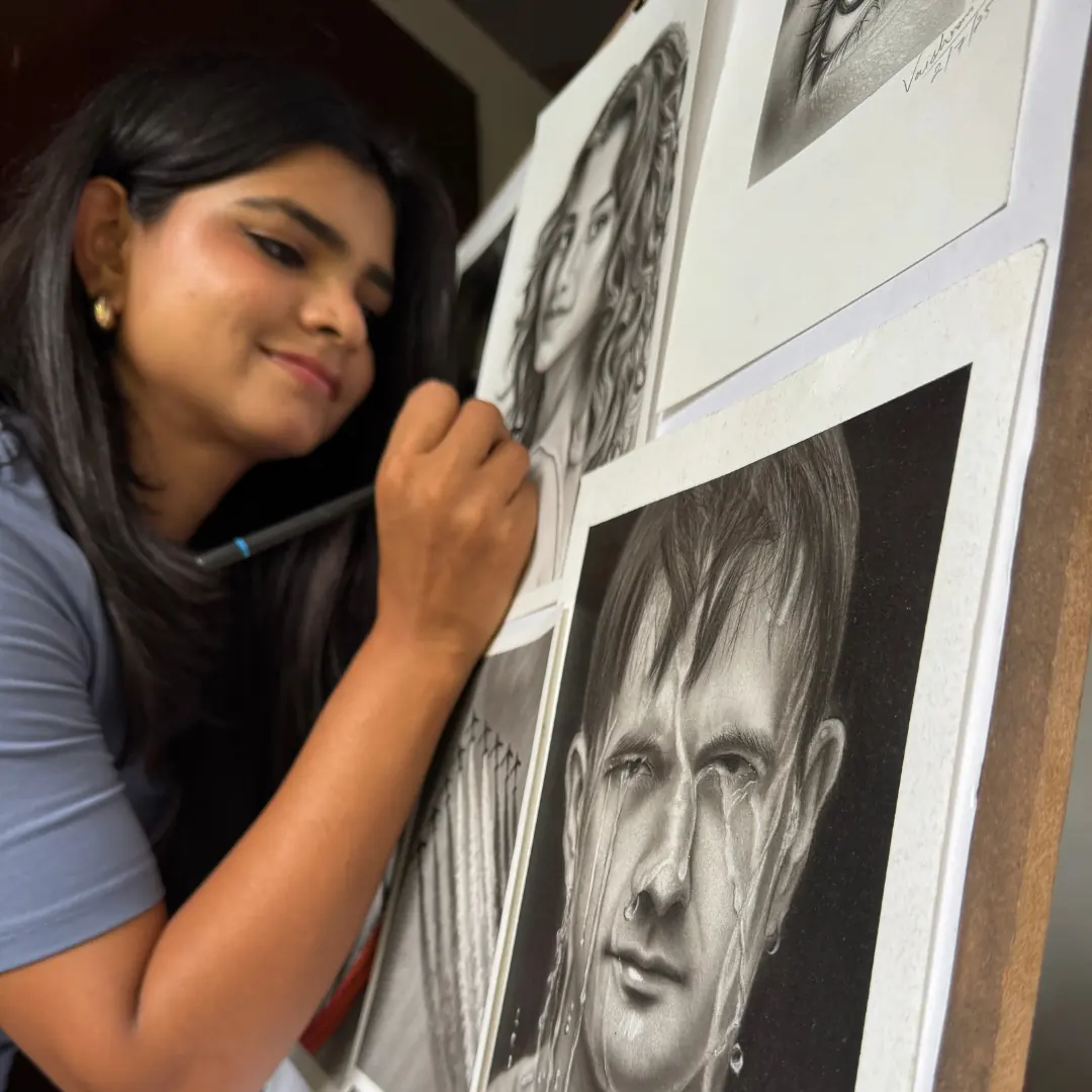 Artist drawing a hyper-realistic charcoal portrait by hand